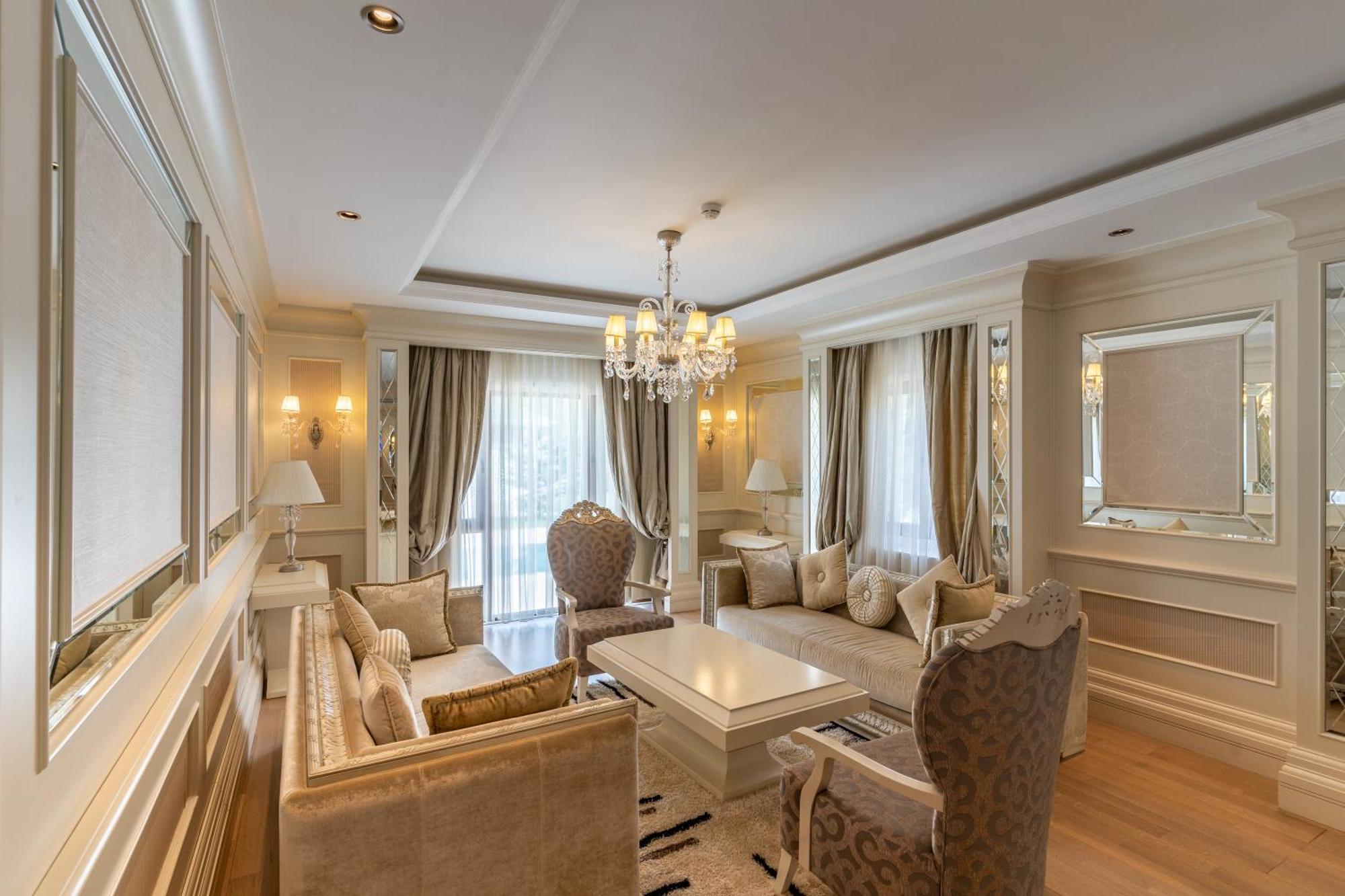 גאלבה Qafqaz Riverside Hotel מראה חיצוני תמונה A living room in the hotel