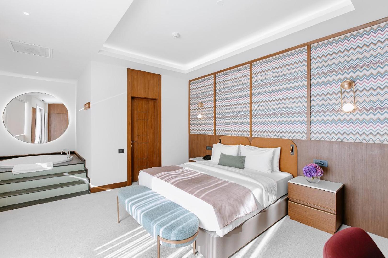 גאלבה Qafqaz Riverside Hotel מראה חיצוני תמונה A bedroom at the hotel